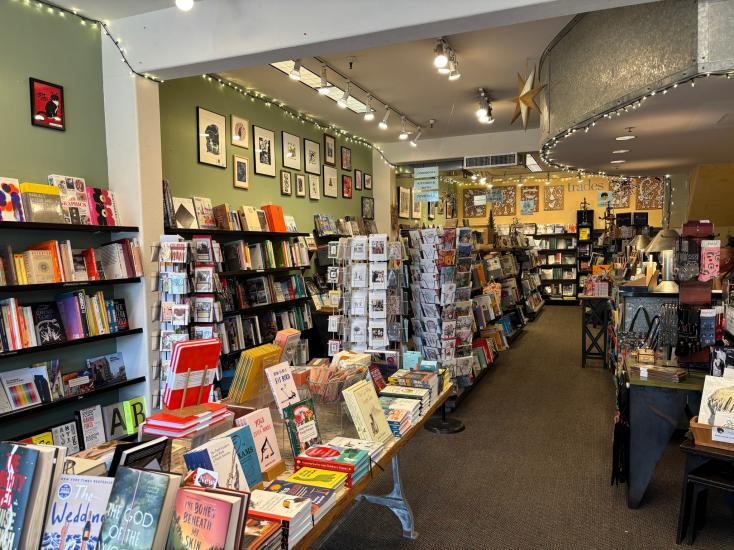 Tables and shelves full of books at Builders Booksource