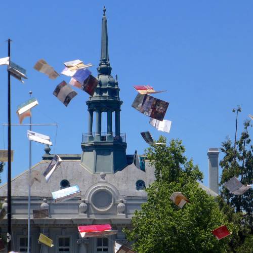 Book covers fly in the air at the Bay Area Book Festival.