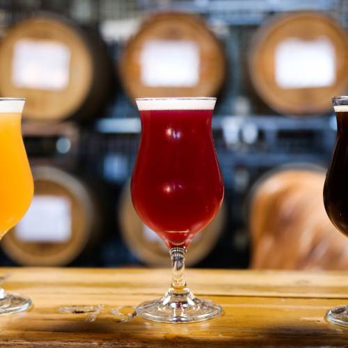 three craft beers on a bar at The Rare Barrel brewery in Berkeley