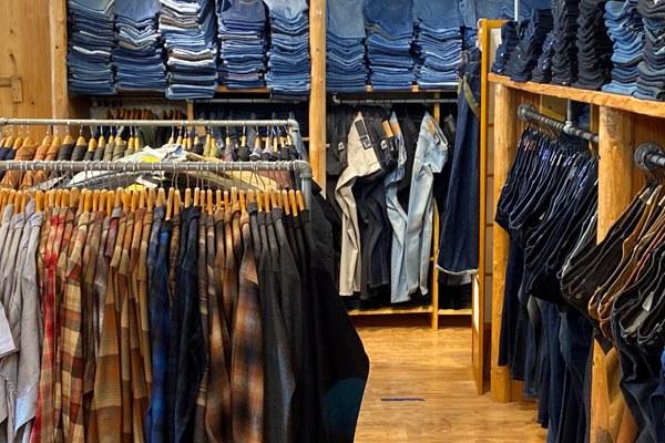 rows of vintage jeans available at Slash Denim, a Berkeley thrift store