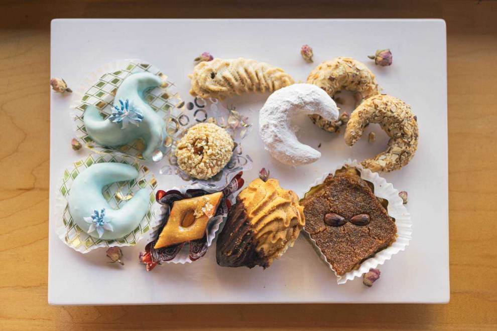 A variety of unique pastries from Belmo Bakery sitting on a white platter