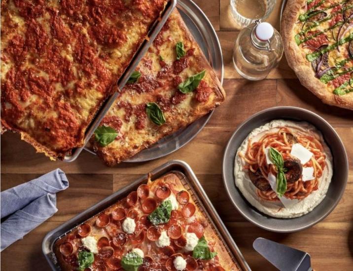 Trays of pizzas from Pizzeria da Laura