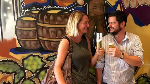 a man and woman enjoying craft beer in Berkeley