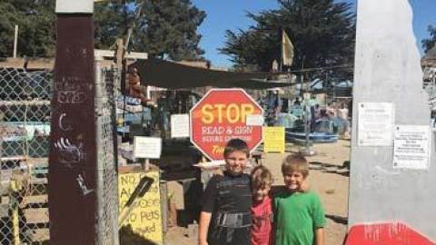 Children standing at entrance to Adventure Playground in Berkeley CA