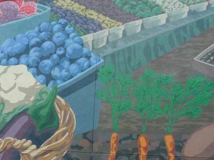 Artist painted Gourmet Ghetto foodie mural in downtown Berkeley California